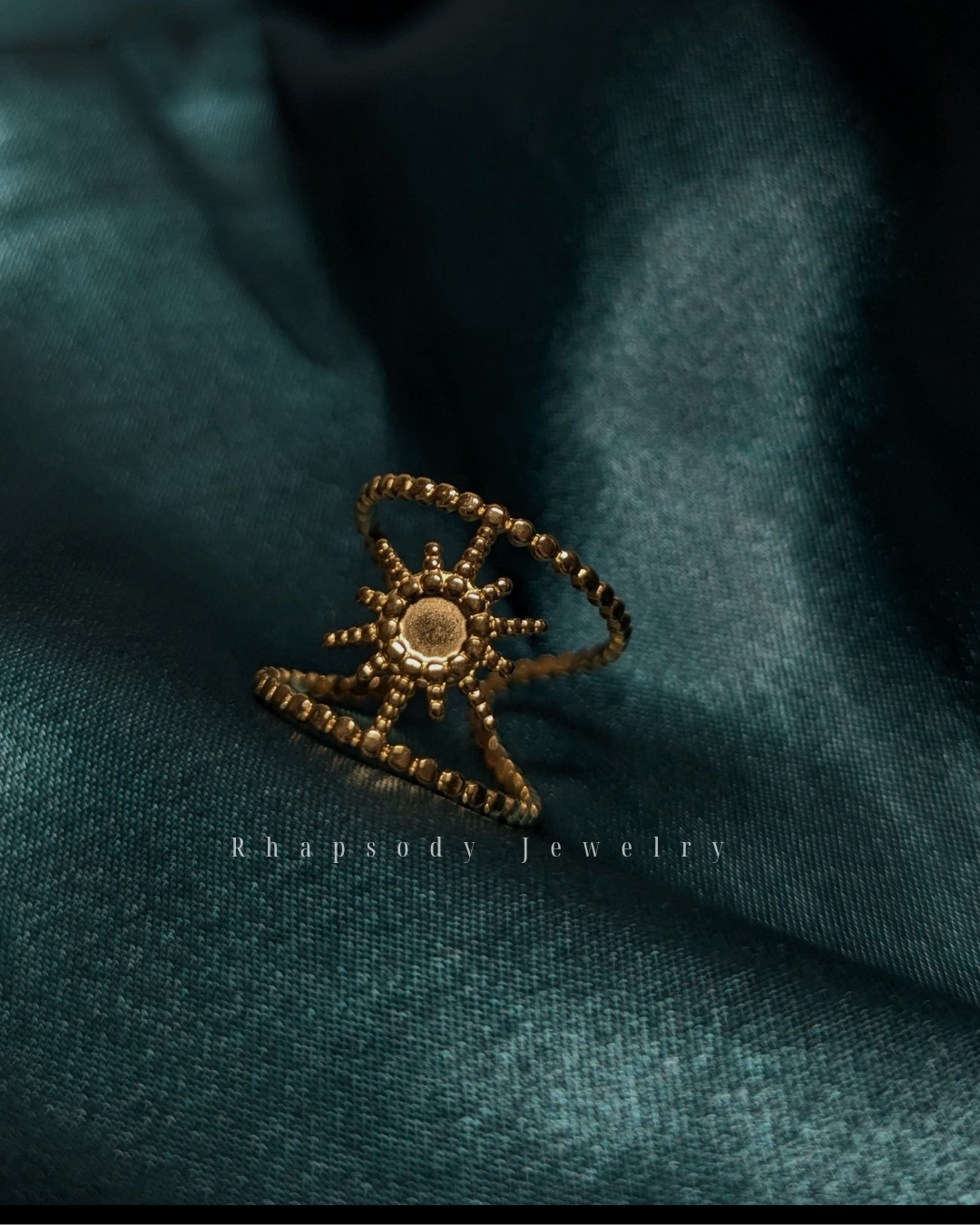 Sun motif geometric ring